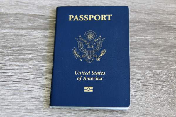 a us passport sitting on a table