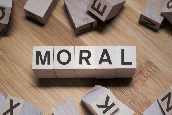 letters on wooden blocks spell moral