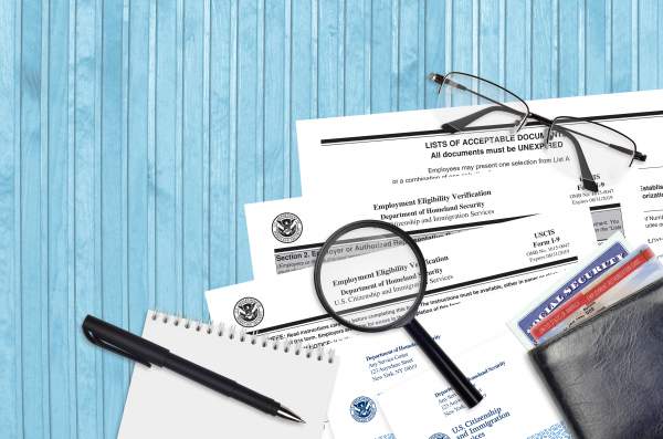 stack of uscis immigration forms