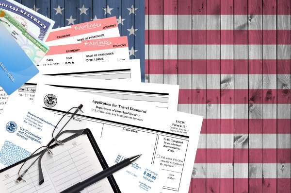 travel documents and other paperwork on u.s. flag