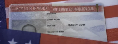 employment-authorization-card-on-american-flag