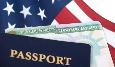 green-card-passport-and-american-flag green-card-passport-and-american-flag